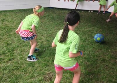 Race to the ball in a game of gaga ball.