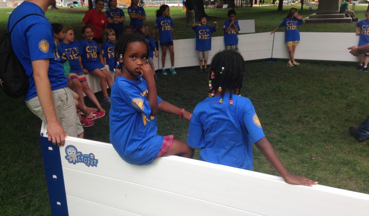 Girls waiting to play gaga ball in the Octopit USA ball pit.