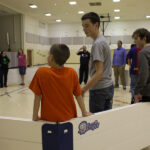 Kids playing gaga ball in Octopit indoors.