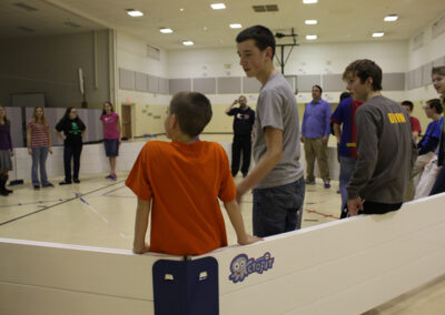 Kids playing gaga ball in Octopit indoors.