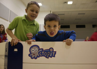 Children playing Gaga Ball indoors with Octopit USA